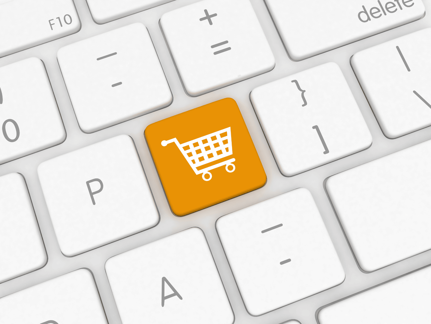 Weiße Tastatur mit orangefarbenem Cart-Button